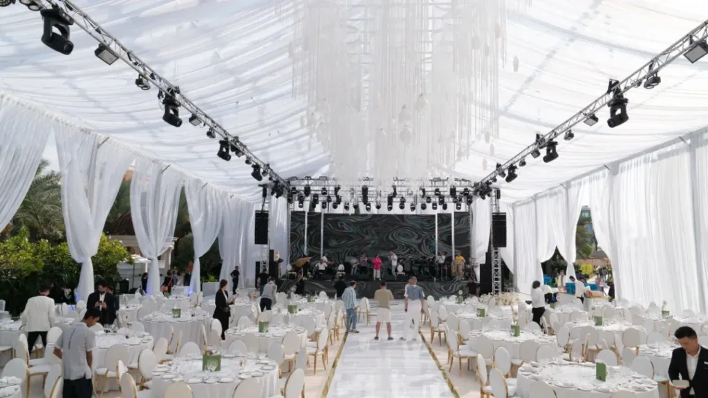 Elegant wedding setup under a large canopy – perfect for Tent And Table Rentals. Ideal for special occasions, this image also represents a Wedding Tent Rental option.