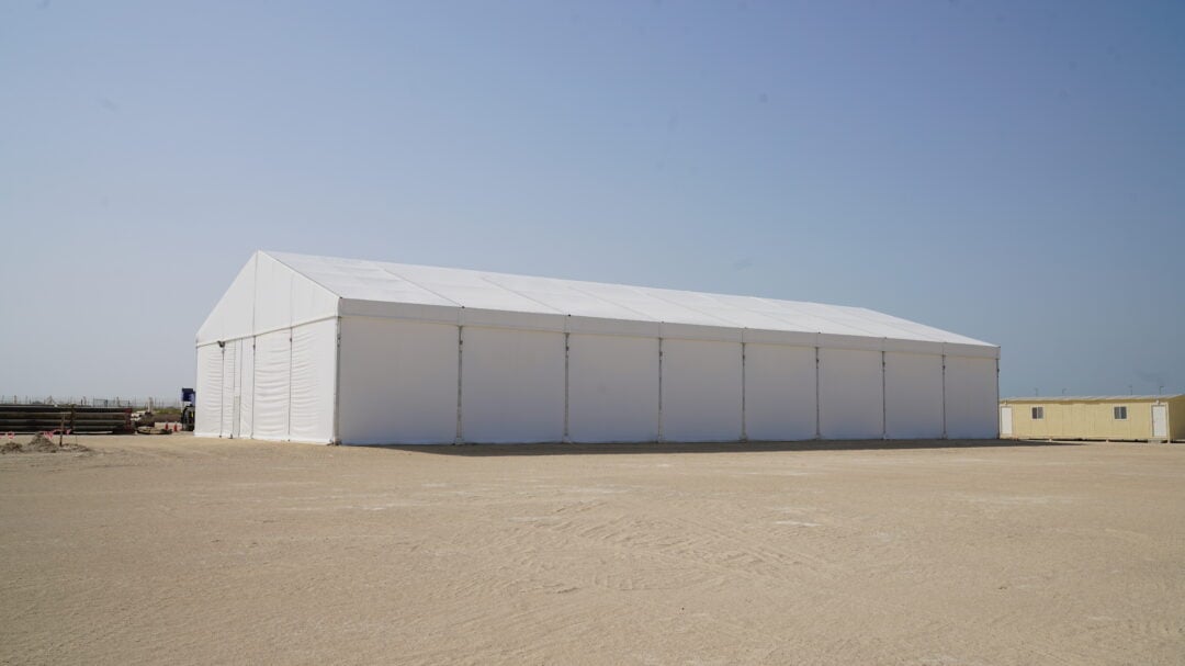 a white tent in the desert