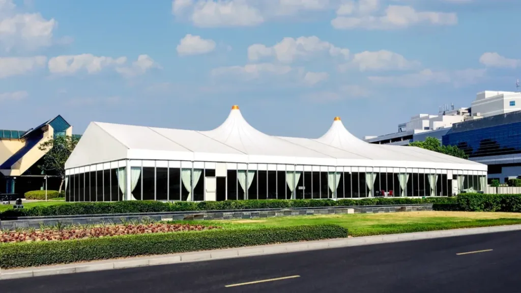 Combo Pyramid Tent a white tent with windows and a lawn